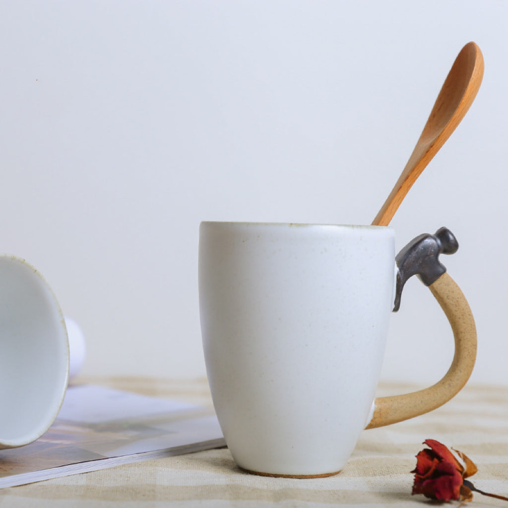 Handmade ceramic mug with handle unique hammer shape cup